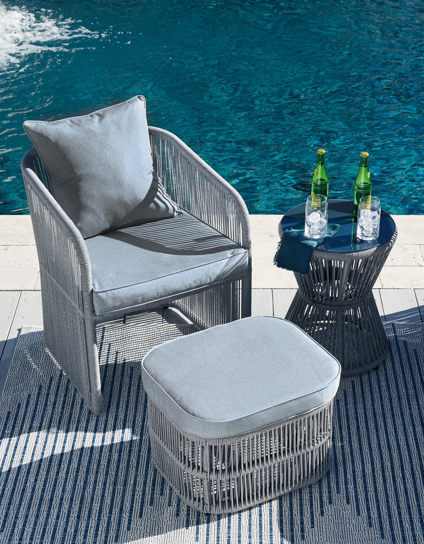 Coast Island outdoor chair, ottoman and side table set
