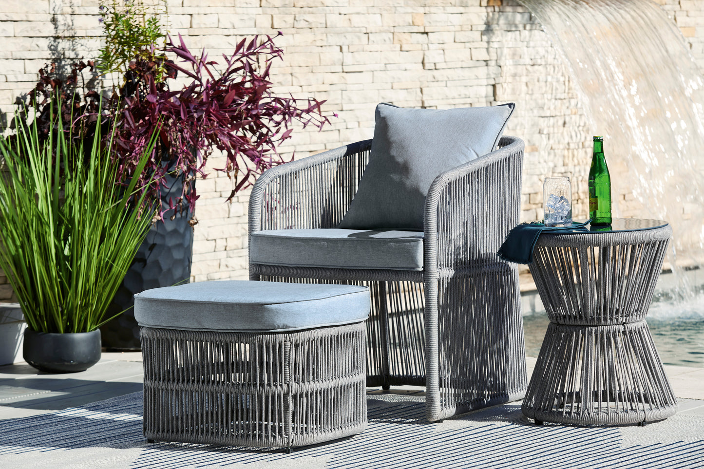 Coast Island outdoor chair, ottoman and side table set